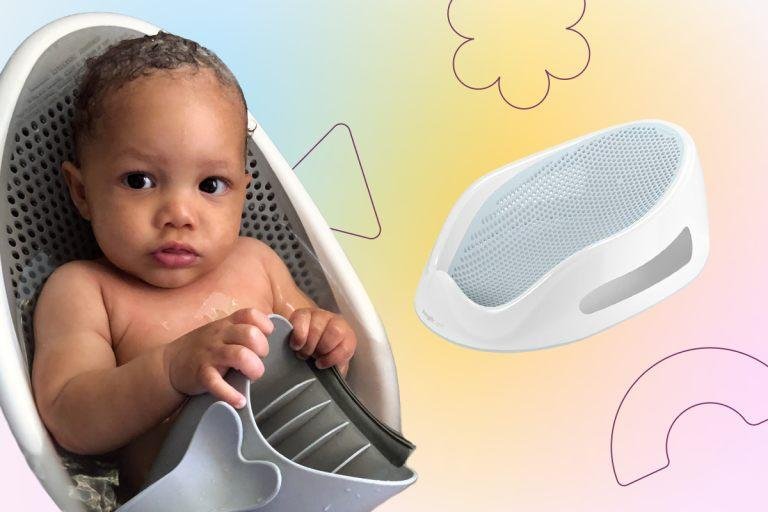 A baby sitting in a bath seat holding a grey bath accessory, with an image of a white and blue baby bath support beside them. The background features pastel colours and abstract shapes.